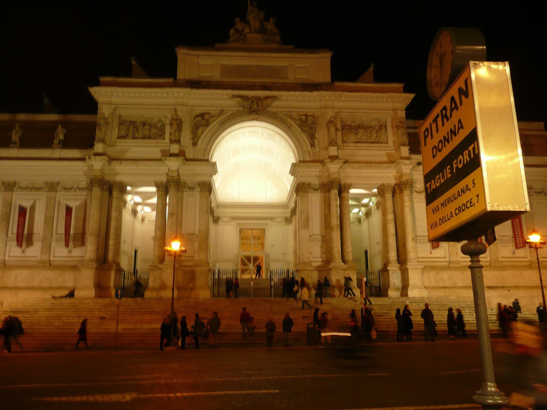 Illuminated façade of Palazzo delle Esposizioni in Rome at night