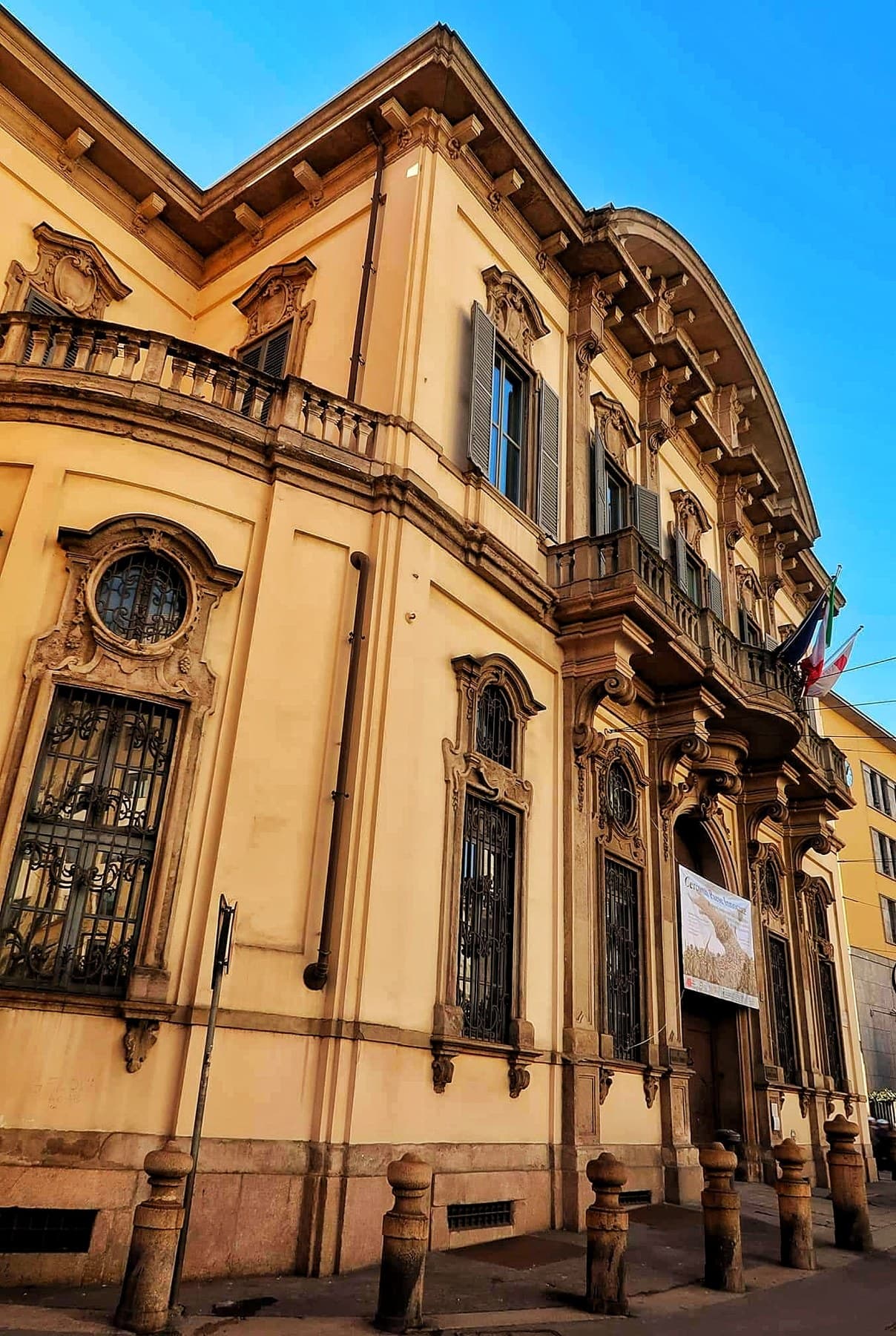 Façade and entrance of Palazzo Sormani in Milan seen from below